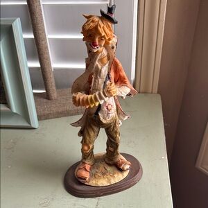 Charming Clown Figurine in Orange and Brown
